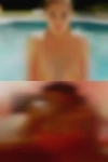 Nude woman grabs the balls