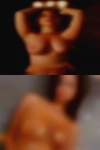 Nude woman grabs the balls