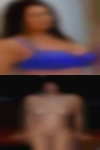 Nude woman grabs the balls